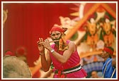 The tribal devotees traditionally dance, sing and play the flute