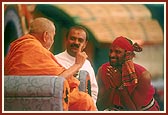 Swamishri blesses the main tribal satsangis