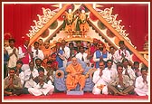 Swamishri with coordinator sadhus and tribal volunteers