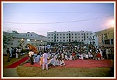 Swamishri arrives in the satsang assembly on the Sanskardham premises