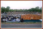 Sadhus and devotees during puja 