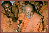 Swamishri sits with the sadhus and rejoices with them