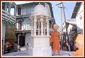 Swamishri performs pradkashina of shrine dedicated to Dungar Bhakta where he played the maan and narrated the Mahabharat