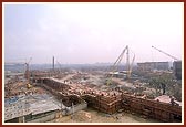 On the far right is the under construction Akshardham monument and in the foreground is the parikrama