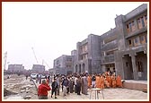 Swamishri on an observation tour of the newly built Sant Ashram and kitchen area