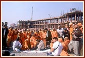 Swamishri observes hall-1 from outside with the parikrama in the background