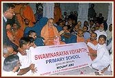Swamishri ritually inaugurates the Swaminarayan Vidyapith Primary School that will officially begin this year at the BAPS Chhatralay in Abu