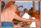 Swamishri initiates Shri Amit S. Patel of London, UK, a BSc. graduate and names him as Gautam Bhagat