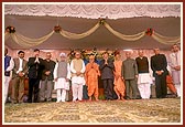 (L to R)  Shri Vallabhbhai Kathiriya (Minister, Govt. of India), Hon. Barry Gardiner (MP, UK), Shri Vijay Kapoor (Lt. Governor, New Delhi), Shri Manmohansingh (Leader of Opposition Rajyasabha, Parliament of India), Shri L. K. Advani (Deputy Prime Minister, India), HDH Swamishri, Shri Narendrabhai Modi (Chief Minister, Gujarat), Pujya Mahant Swami, Shri L. M. Singhvi (MP), Shri Ashokbhai Bhatt (Minister, Govt. of Gujarat), Shri Madhavsinhji Diwan (Minister, Govt. of Rajasthan), Shri Jayantibhai Barot (MP)