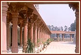 The impressive red-stone pradakshina that surrounds the mandir