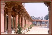 The impressive red-stone pradakshina that surrounds the mandir