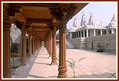 The impressive red-stone pradakshina that surrounds the mandir