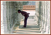 The beautiful mandir pradakshina with ornate pillars, ceilings and murtis of paramhansas and devotees