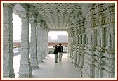 The beautiful mandir pradakshina with ornate pillars, ceilings and murtis of paramhansas and devotees