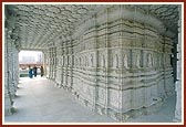 The beautiful mandir pradakshina with ornate pillars, ceilings and murtis of paramhansas and devotees