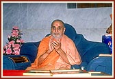 Swamishri responds happily to a devotional bhajan sung by a Sikh devotee during his morning puja