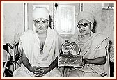 Swamishri and Kothari Swami during a home-visit at the house of Narayanbhai Soni, Amalner
