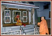 Swamishri engaged in darshan of deities at the Swaminarayan Mandir