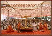 Swamishri performs the bhumi pujan for a new Hari mandir and chhatralay. Thereafter the tribal devotees honor Shri Harikrishna Maharaj