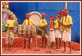 Tribal devotees perform a traditional dance