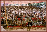 Tribal devotees in the satsang assembly