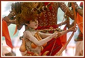 Tribal devotees perform a traditional dance