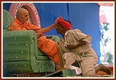 Swamishri blesses the satsangi tribal volunteer