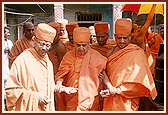 Swamishri departs from the sanctified home. All the villagers had prepared such decorative rangolis outside their homes as a symbol of welcome for Swamishri