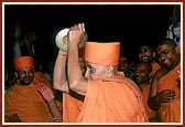 Swamishri pleases the devotees by participating in singing and playing of cymbals