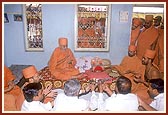 Swamishri during the home-visit at Harkorbai's home, a leading devotee 