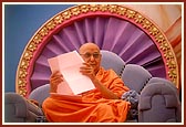 Swamishri while attending to letters
