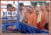 Swamishri blesses an ailing youth for a quick recovery