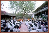 The satsang assembly in the darbar courtyard 