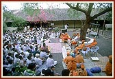 The satsang assembly in the darbar courtyard 
