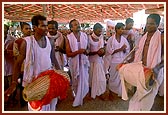 While playing the khol and cymbals devotees from Orissa sing dhun