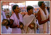 While playing the khol and cymbals devotees from Orissa sing dhun