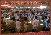 While playing the khol and cymbals devotees from Orissa sing dhun