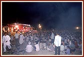 Balaks perform a welcome dance amidst the smoke of fireworks