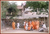 Swamishri observes the construction work