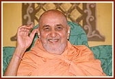  Swamishri in a joyous mood during a satsang assembly
