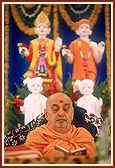  Reading the Shikshapatri during his morning puja