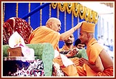  Swamishri gives diksha-mantra and initiates a parshad into the sadhu-fold