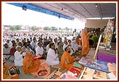 Swamishri performs the murti-pratishtha rituals of Shri Akshar Purushottam Maharaj and Guru Parampara for the hari mandir in Traj village