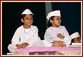 Children listen to Swamishri