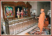Swamishri performs murti-pratishtha arti of Thakorji at the Swaminarayan Sanskardham in Naroda, Amdavad