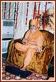 Addresses the satsang assembly