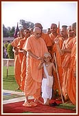 Swamishri blesses the balak dressed as Mahatma Gandhi