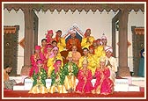 Balaks with Swamishri after performing a dance