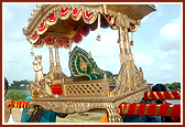 Shri Harikrishna Maharaj on a palanquin during a procession