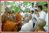 Swamishri blesses the sadhaks in the mandir pradakshina